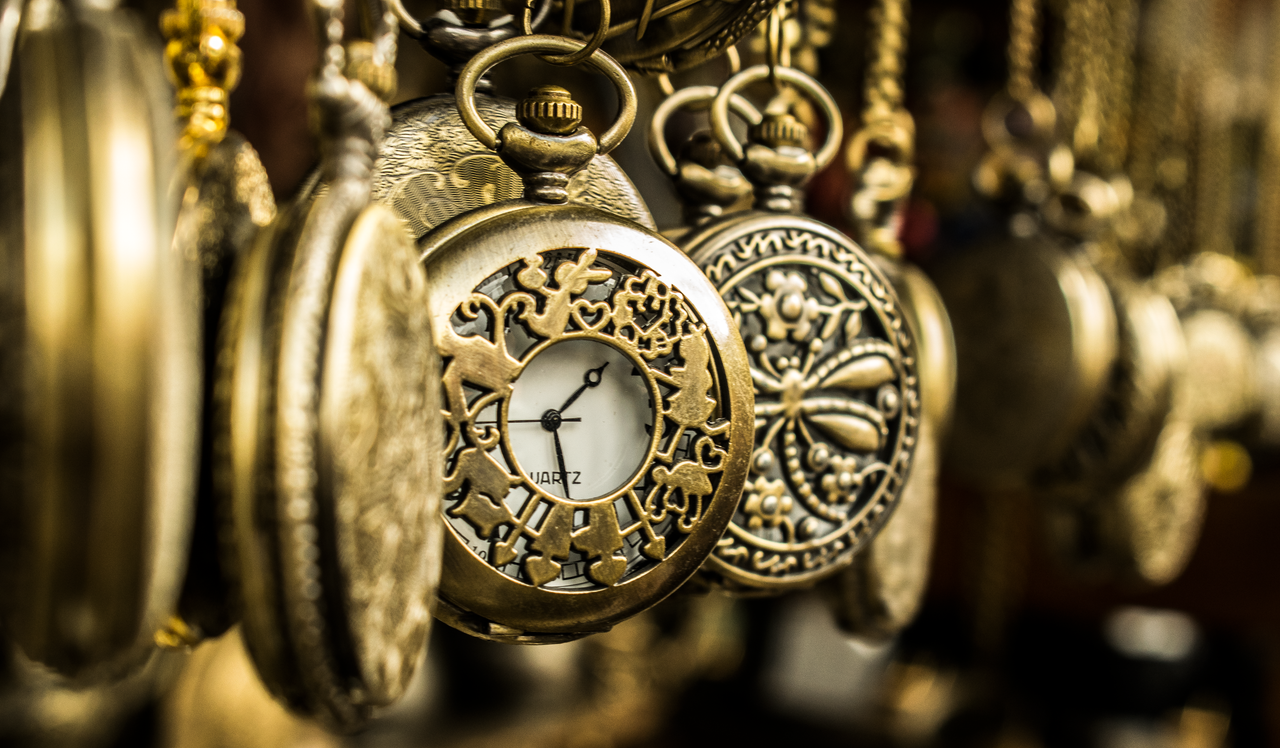 About Close-up of ornate vintage pocket watches showcasing intricate designs and luxury aesthetics.